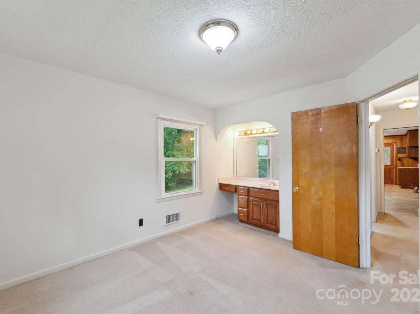 46 Donna Dale Avenue, Concord, NC 28025.  MLS# CAR4268171, YatesRealty ID 21700. Half bath in the primary bed