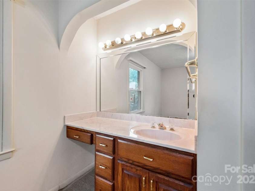 46 Donna Dale Avenue, Concord, NC 28025.  MLS# CAR4268171, YatesRealty ID 21700. Vanity in half bath