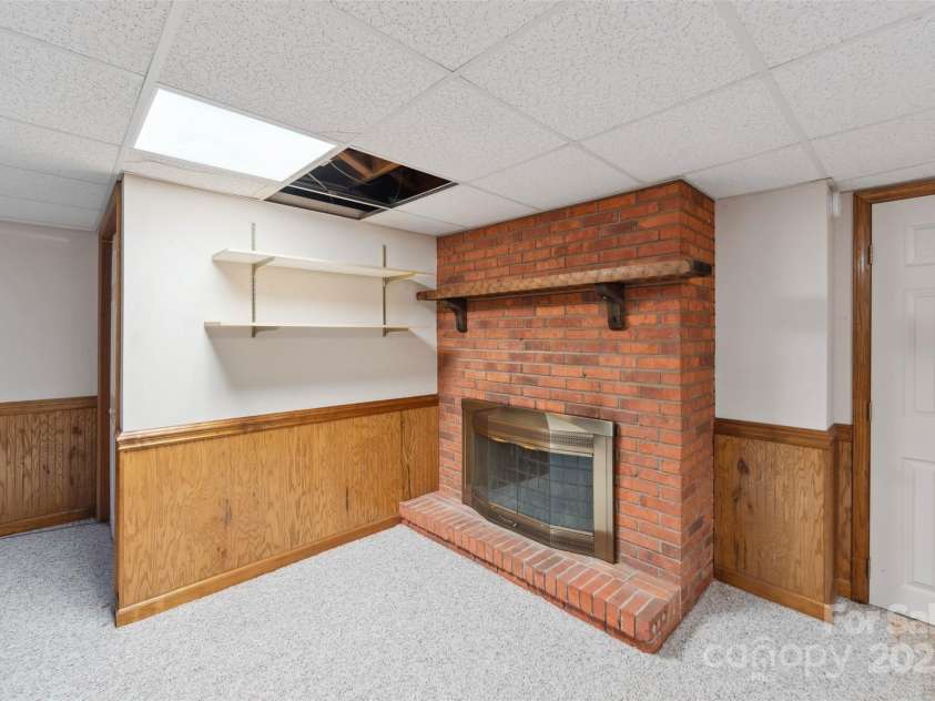 46 Donna Dale Avenue, Concord, NC 28025.  MLS# CAR4268171, YatesRealty ID 21700. View of fireplace