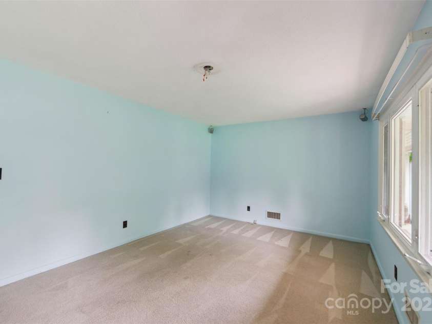 46 Donna Dale Avenue, Concord, NC 28025.  MLS# CAR4268171, YatesRealty ID 21700. View of living room from the front door
