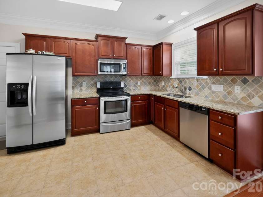 1601 Sumpter Lane, Monroe, NC 28110.  MLS# CAR4381627, YatesRealty ID 21701. 
