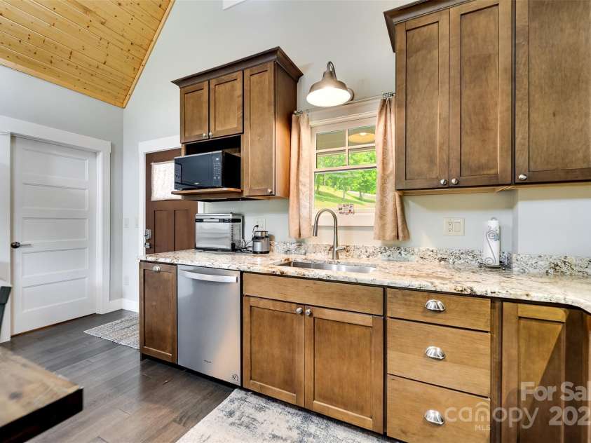 396 River Club Drive, Cullowhee, NC 28723.  MLS# CAR4272176, YatesRealty ID 21701. 