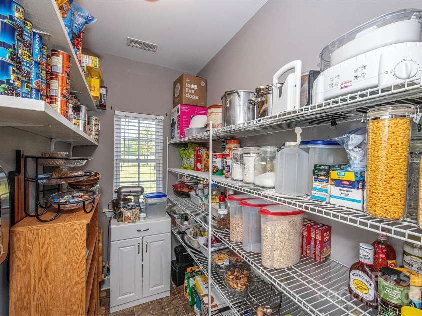 340 Hound Hollow Road, Camden, SC 29020.  MLS# CAR4240958, YatesRealty ID 21717. Large Walk in Pantry