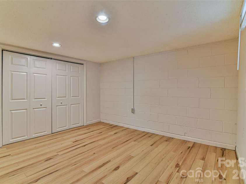 101 Skyland Circle, Asheville, NC 28804.  MLS# CAR4381917, YatesRealty ID 21725. Basement Bedroom