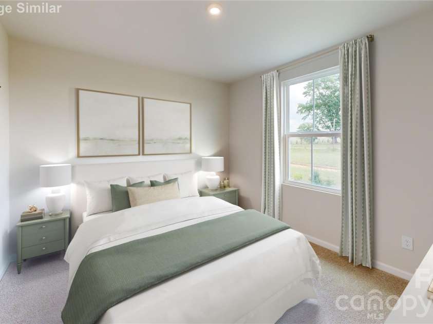 1330 Elm Forest Lane, China Grove, NC 28023.  MLS# CAR4385552, YatesRealty ID 21726. Wow—another spacious bedroom ready to shine! Featuring a stylish double-door closet and a large window that pours in natural light, this room is the perfect size for comfort and creativity. A blank canvas just waiti