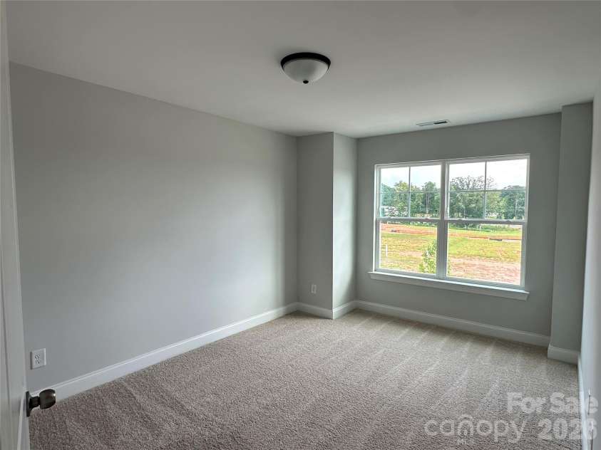124 Pointer Trail, Troutman, NC 28166.  MLS# CAR4381982, YatesRealty ID 21736. Bedroom 3