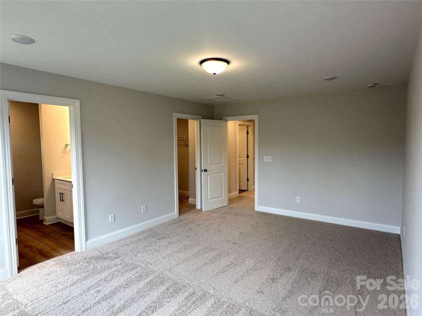 124 Pointer Trail, Troutman, NC 28166.  MLS# CAR4381982, YatesRealty ID 21736. Primary Bedroom