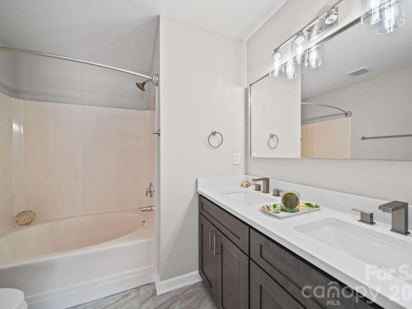 12719 Persimmon Tree Drive, Charlotte, NC 28273.  MLS# CAR4382115, YatesRealty ID 21740. Double Quartz Vanity