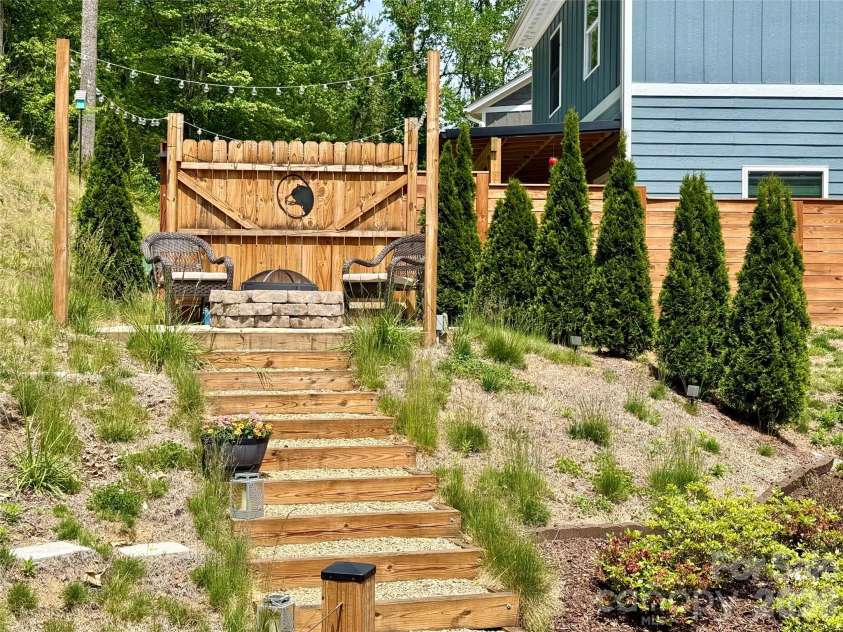 116 Northbend Drive, Asheville, NC 28804.  MLS# CAR4372052, YatesRealty ID 21746. Steps to fire pit