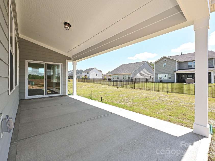 2211 Camber Drive, Gastonia, NC 28054.  MLS# CAR4222812, YatesRealty ID 21750. Rear Covered Patio