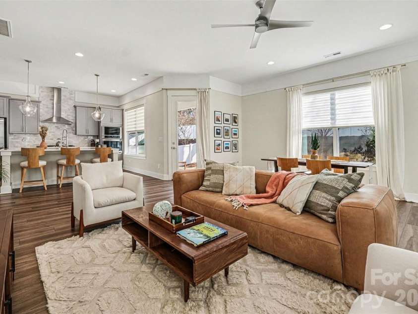 5010 Whitman Avenue, Matthews, NC 28105.  MLS# CAR4333513, YatesRealty ID 21750. Open concept living and dining