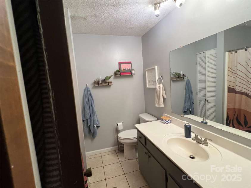 33611 Mann Road, Albemarle, NC 28001.  MLS# CAR4247905, YatesRealty ID 21759. Main Bathroom