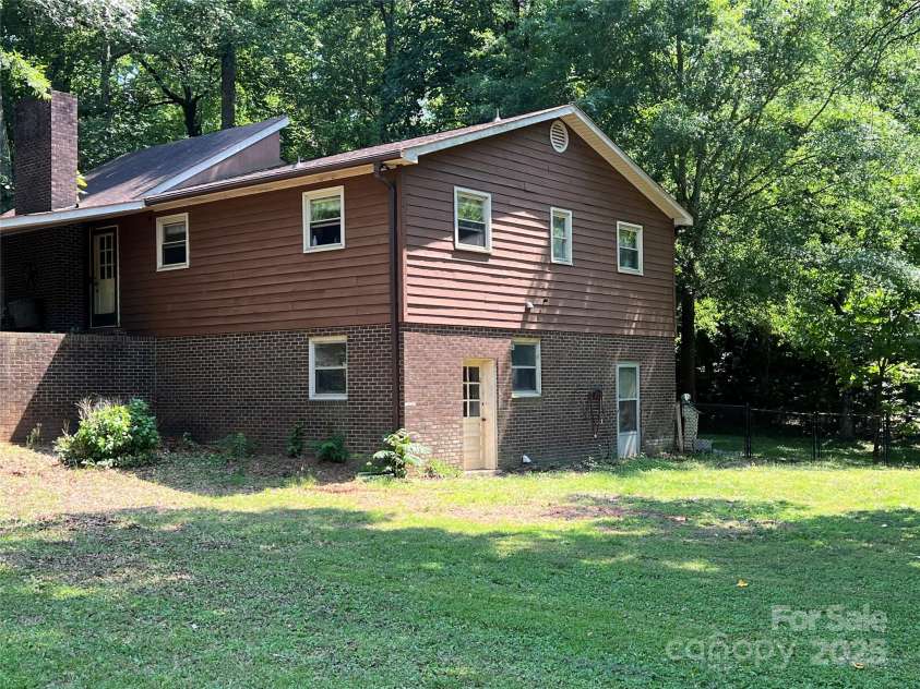 33611 Mann Road, Albemarle, NC 28001.  MLS# CAR4247905, YatesRealty ID 21759. Rear of house