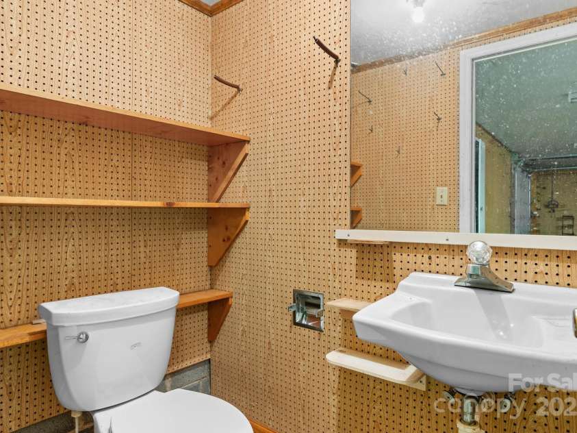 4002 Hickory Boulevard, Granite Falls, NC 28630.  MLS# CAR4265379, YatesRealty ID 2176. 1/2 Bath in Garage