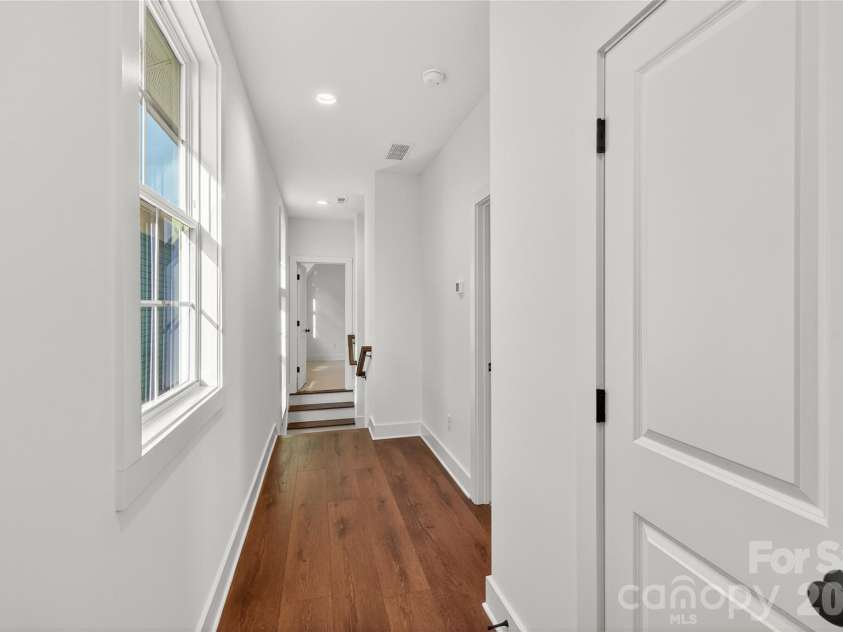 9113 Maybry Park Street, Charlotte, NC 28212.  MLS# CAR4265824, YatesRealty ID 2176. Upper hallway
