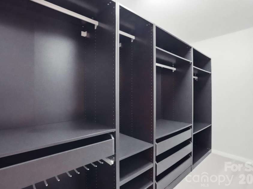 10851 Garden Oaks Lane, Charlotte, NC 28273.  MLS# CAR4376158, YatesRealty ID 21761. Custom primary closet