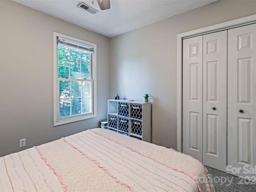 110 Club Drive, Mooresville, NC 28115.  MLS# CAR4272033, YatesRealty ID 21762. Bedroom 2 w/Double Door Closet