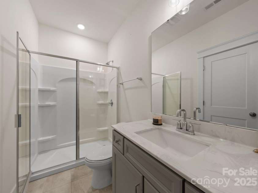 619 R L Stowe Road, Belmont, NC 28012.  MLS# CAR4329800, YatesRealty ID 2177. Main level full bathroom