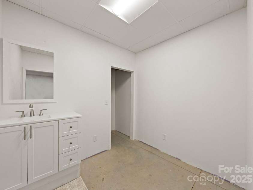 619 R L Stowe Road, Belmont, NC 28012.  MLS# CAR4329800, YatesRealty ID 2177. Partially finished basement