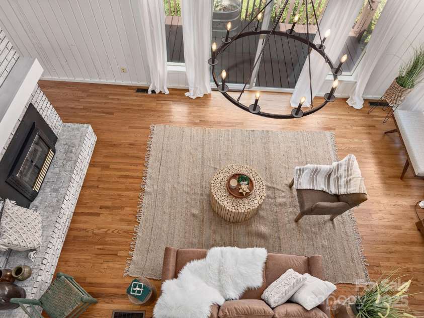 1469 Old Fort Road, Fairview, NC 28730.  MLS# CAR4240790, YatesRealty ID 21774. Overlooking living room from loft walkway
