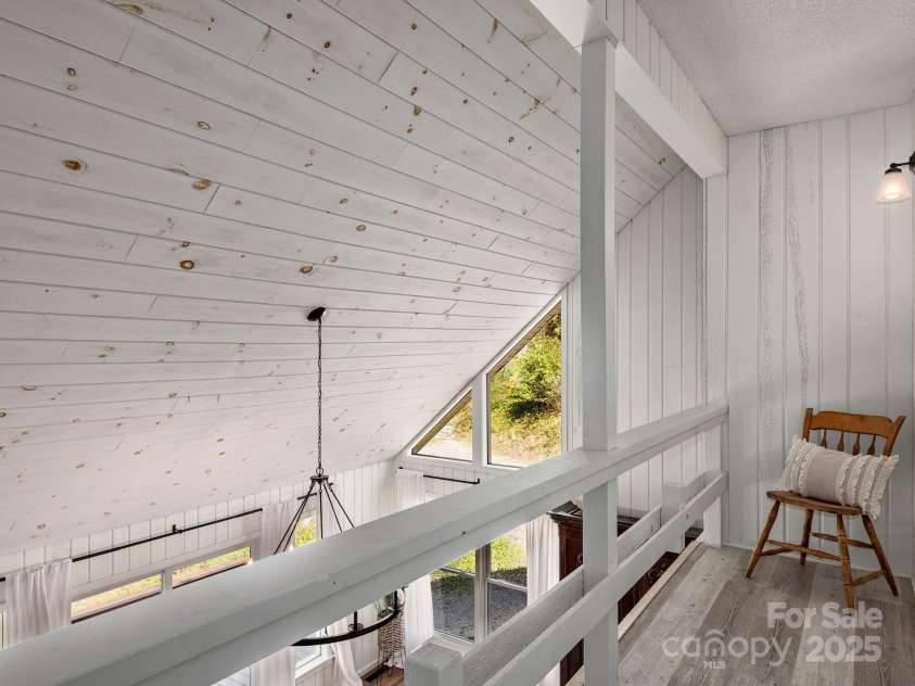 1469 Old Fort Road, Fairview, NC 28730.  MLS# CAR4240790, YatesRealty ID 21774. View from lofted upper level overlooking main living area