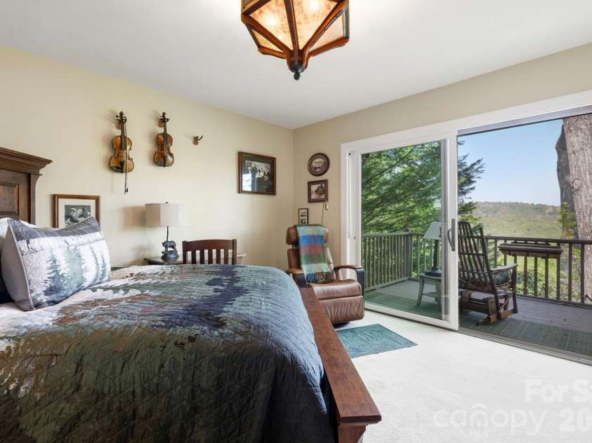 8 Spring Ridge Lane, Hendersonville, NC 28739.  MLS# CAR4374378, YatesRealty ID 21776. Lower Level Bedroom