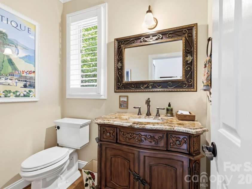8 Spring Ridge Lane, Hendersonville, NC 28739.  MLS# CAR4374378, YatesRealty ID 21776. Main Level 1/2 Bath