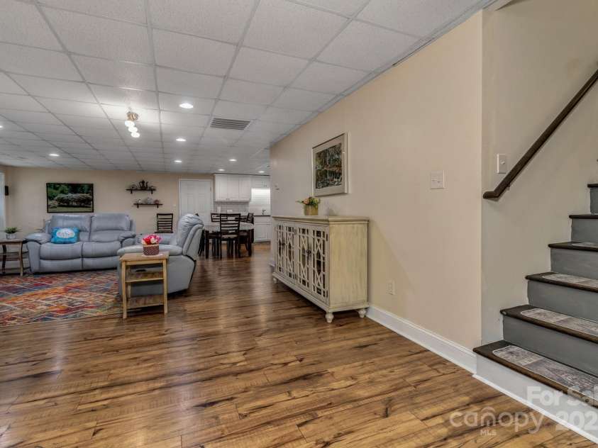 2790 Twin Oaks Drive, Morganton, NC 28655.  MLS# CAR4267085, YatesRealty ID 21778. Basement living room.