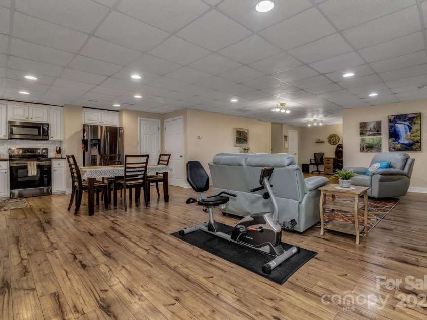 2790 Twin Oaks Drive, Morganton, NC 28655.  MLS# CAR4267085, YatesRealty ID 21778. Basement/in-law open living with Kitchen, dining and living space.
