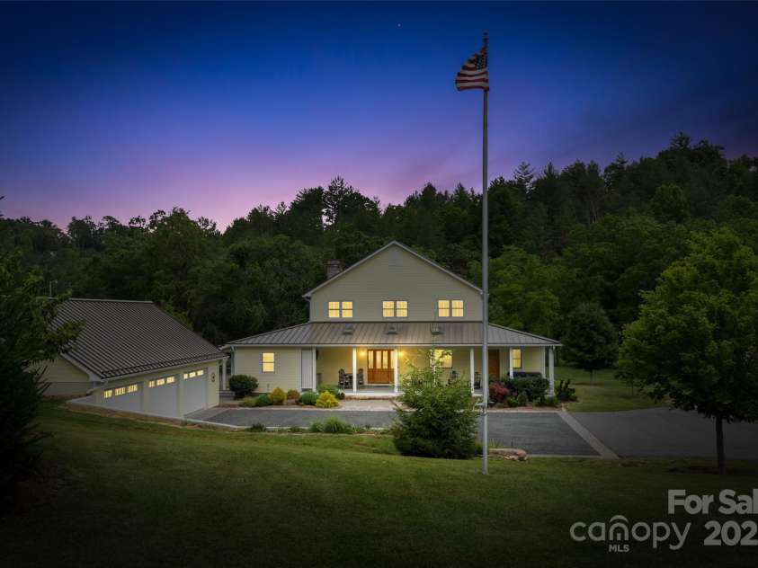 971 Banks Creek Road, Burnsville, NC 28714.  MLS# CAR4270100, YatesRealty ID 21780. A glimpse of what a stunning twilight evening looks like on this property—simply breathtaking