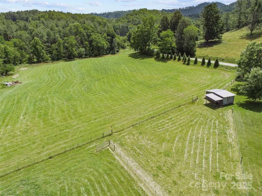 971 Banks Creek Road, Burnsville, NC 28714.  MLS# CAR4270100, YatesRealty ID 21780. Scenic and productive pastureland ideal for farming, grazing, or recreation.