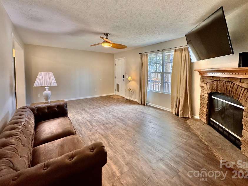 231 Newberry Drive, Fletcher, NC 28732.  MLS# CAR4221734, YatesRealty ID 21787. Spacious LIving Room