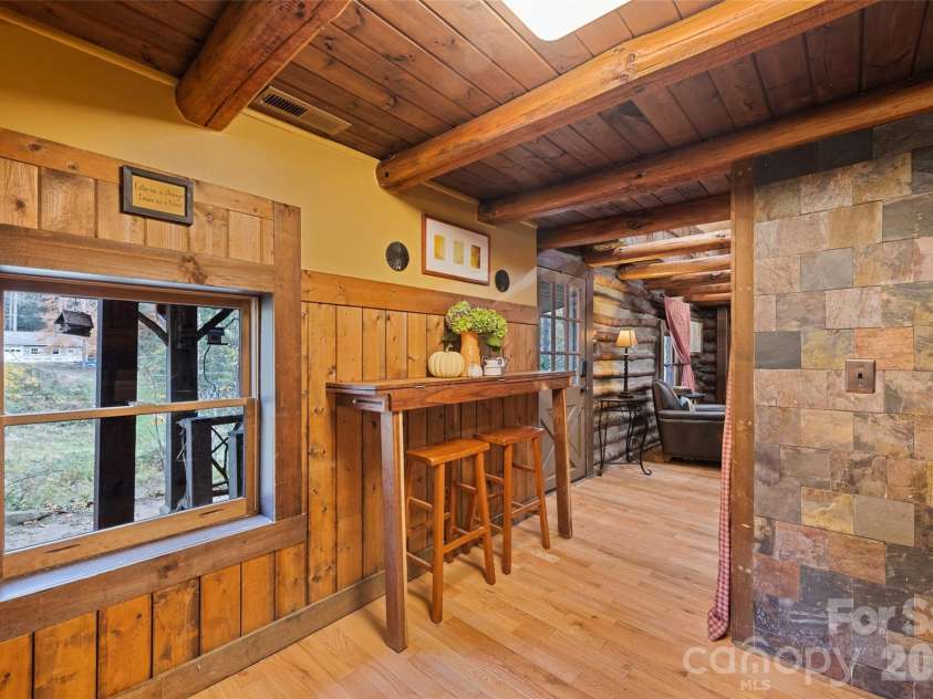 12 Victoria Rose Lane, Waynesville, NC 28785.  MLS# CAR4354477, YatesRealty ID 21789. Save Space with a Retractable Kitchen Table