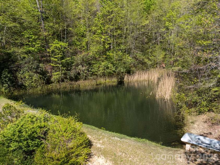 78 Bird Creek Estates Road, Black Mountain, NC 28711.  MLS# CAR4373623, YatesRealty ID 21792. AI Added Water-2nd Pond
