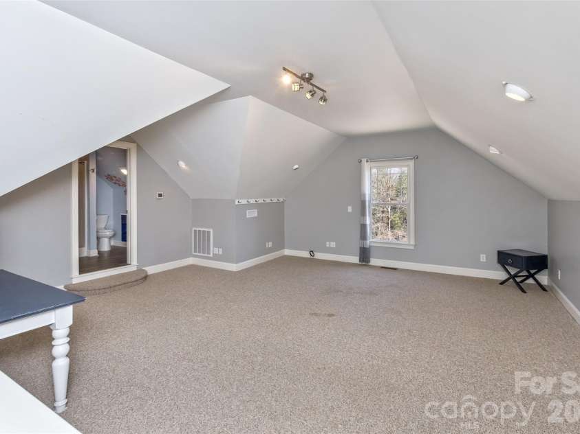 378 Collinsville Road, Columbus, NC 28722.  MLS# CAR4366416, YatesRealty ID 21793. 2nd floor 4th bedroom/guest quarters. Easily accessed by the stairs near the garage. 