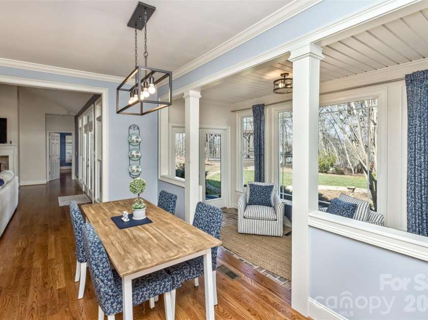 378 Collinsville Road, Columbus, NC 28722.  MLS# CAR4366416, YatesRealty ID 21793. Breakfast area between the kitchen and sunroom.