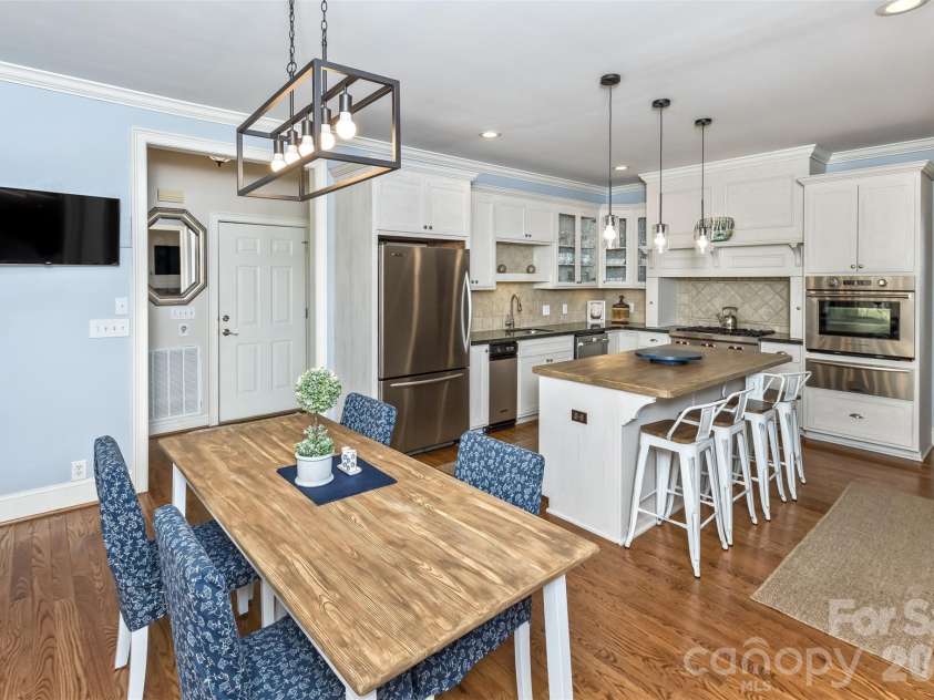 378 Collinsville Road, Columbus, NC 28722.  MLS# CAR4366416, YatesRealty ID 21793. Designer lighting and open concept breakfast area.