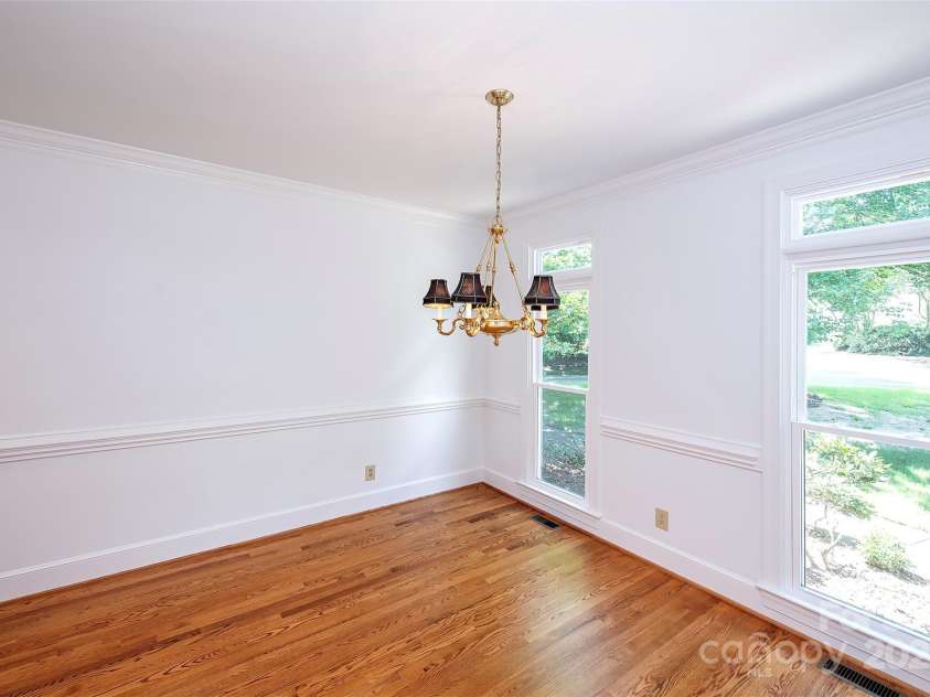 10408 Hadleigh Place, Charlotte, NC 28210.  MLS# CAR4270880, YatesRealty ID 21794. Dining room with chair rail