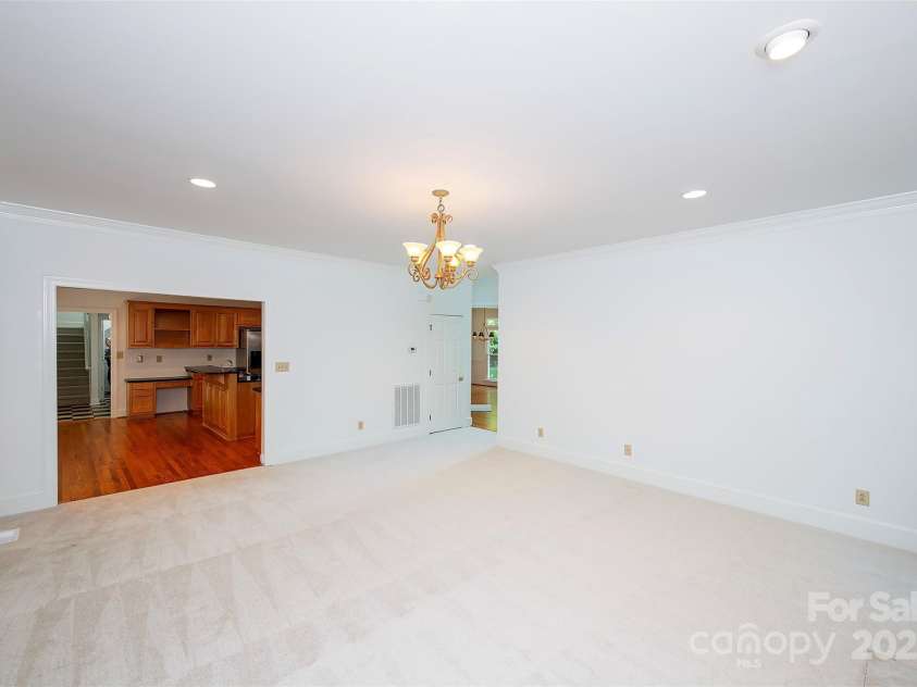 10408 Hadleigh Place, Charlotte, NC 28210.  MLS# CAR4270880, YatesRealty ID 21794. Family room opens to kitchen