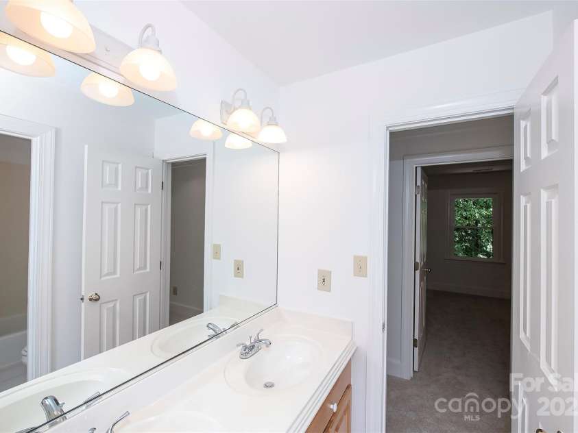 10408 Hadleigh Place, Charlotte, NC 28210.  MLS# CAR4270880, YatesRealty ID 21794. Full bath connects to bedroom and hall