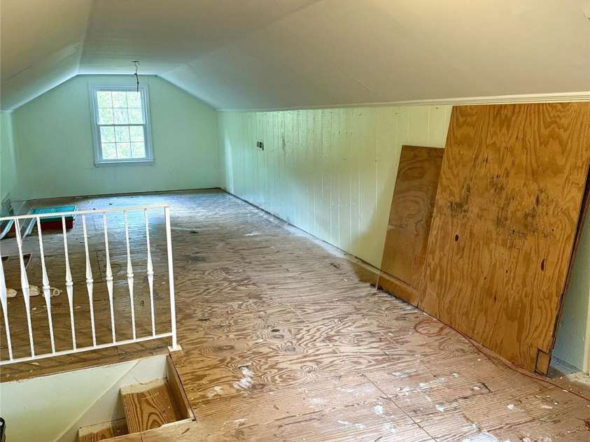 2530 Weathersford Road, Mint Hill, NC 28227.  MLS# CAR4376726, YatesRealty ID 21798. Third-floor heated and cooled flex space with two windows, offering great natural light; unfinished flooring provides a value-add opportunity. Additional access to attic storage.