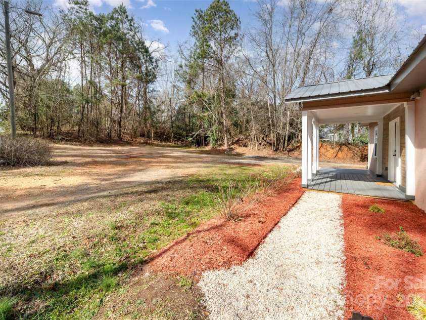 1111 Barrington Street, Wadesboro, NC 28170.  MLS# CAR4224838, YatesRealty ID 2180. Rear Yard