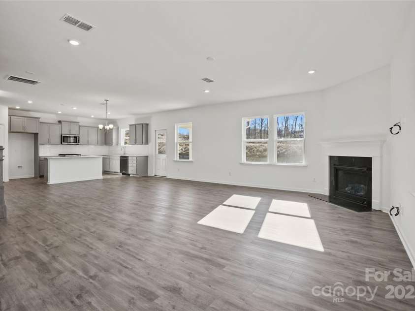 14113 New Crest Lane, Huntersville, NC 28078.  MLS# CAR4268587, YatesRealty ID 21802. Large Gathering Area with Gas Fireplace