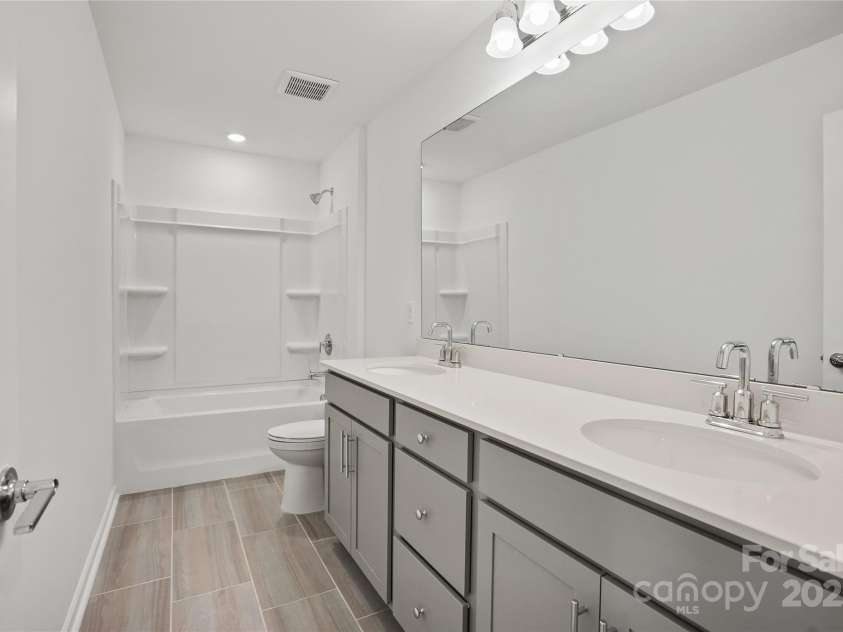 14113 New Crest Lane, Huntersville, NC 28078.  MLS# CAR4268587, YatesRealty ID 21802. Secondary Bathroom