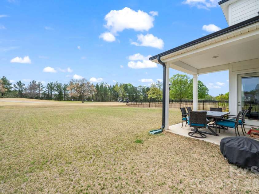 2023 Turnsberry Drive, Monroe, NC 28112.  MLS# CAR4363476, YatesRealty ID 21807. Backyard