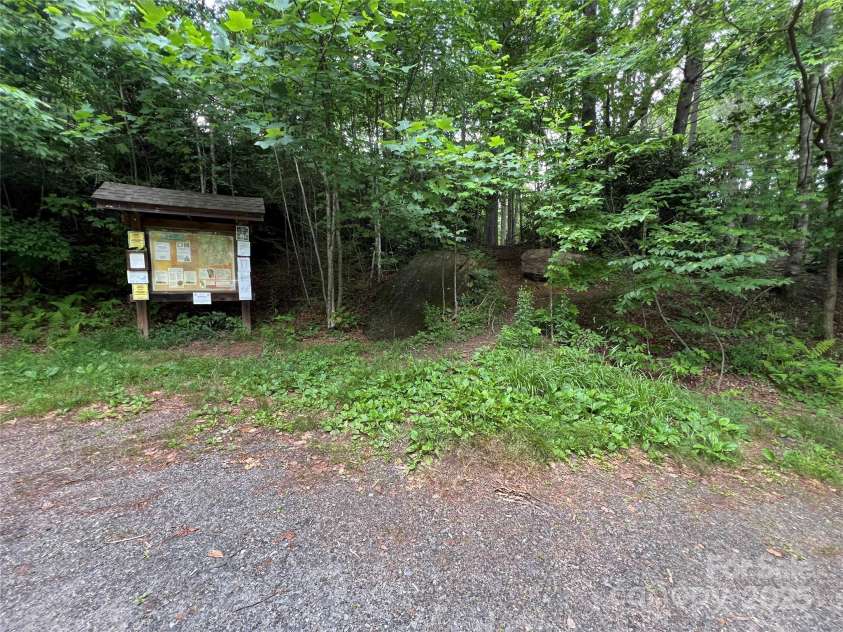 125 Heartland Lane, Burnsville, NC 28714.  MLS# CAR4273356, YatesRealty ID 21808. Colbert Ridge Trail Head steps away!