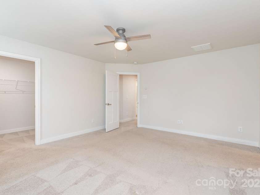 138 Lanyard Drive, Mooresville, NC 28117.  MLS# CAR4260575, YatesRealty ID 21810. Large Primary Suite with walk-in closet
