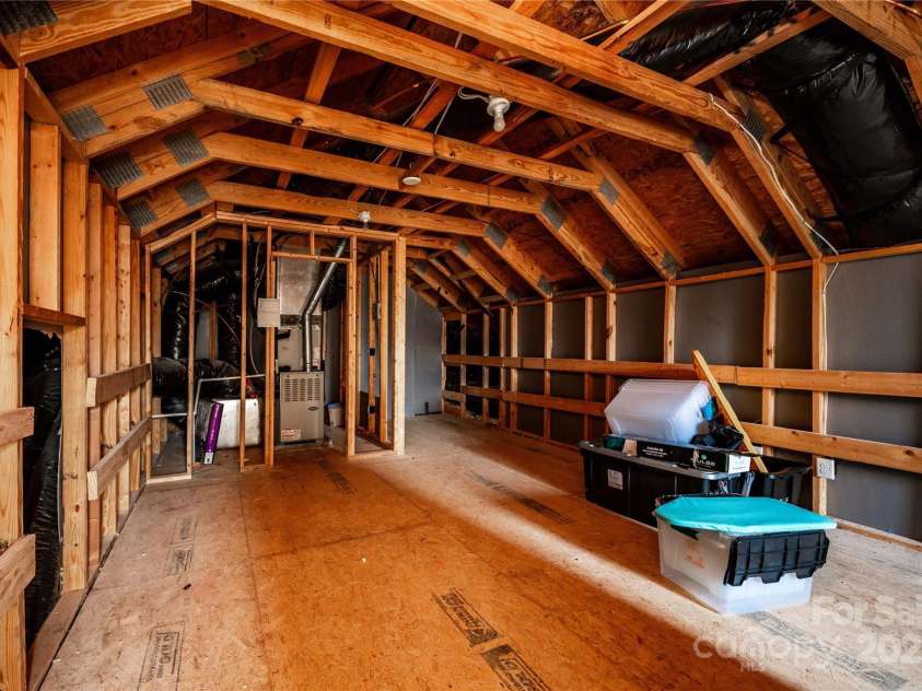 203 Rustling Waters Drive, Mooresville, NC 28117.  MLS# CAR4266533, YatesRealty ID 21811. 3rd floor unfinished walk-in attic space - storage anyone?