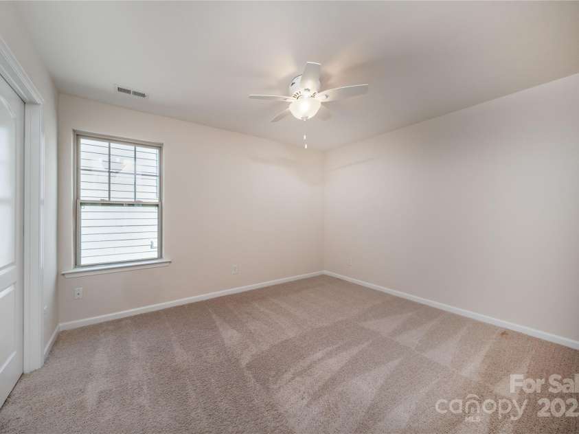 203 Rustling Waters Drive, Mooresville, NC 28117.  MLS# CAR4266533, YatesRealty ID 21811. Bedroom 3 has walk-in closet