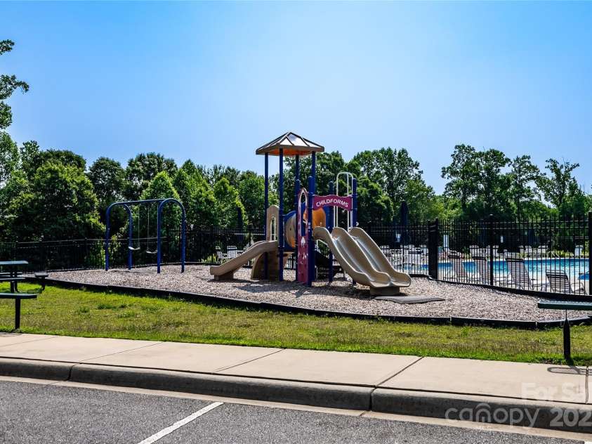 203 Rustling Waters Drive, Mooresville, NC 28117.  MLS# CAR4266533, YatesRealty ID 21811. Community playground